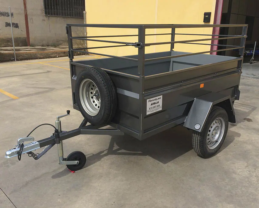 Remolque-caja-abierta-1.800-x-1.150-x-500-barandilla-40-cm-desmontable.webp Remolque 1 eje 1.800 x 1.150 x 500 – Mma 750 kg - Imagen 1