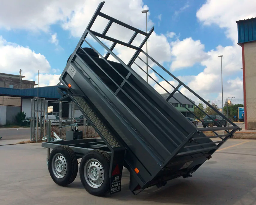 Remolques-basculantes-BARATOS-en-Valencia-Castellon-Alicante-Hues.jpg.webp Remolque basculante hidráulico de 2 ejes con ruedas externas - Imagen 1