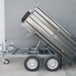 Remolque basculante hidráulico 2 ejes con sobrelateral – Ruedas por fuera –